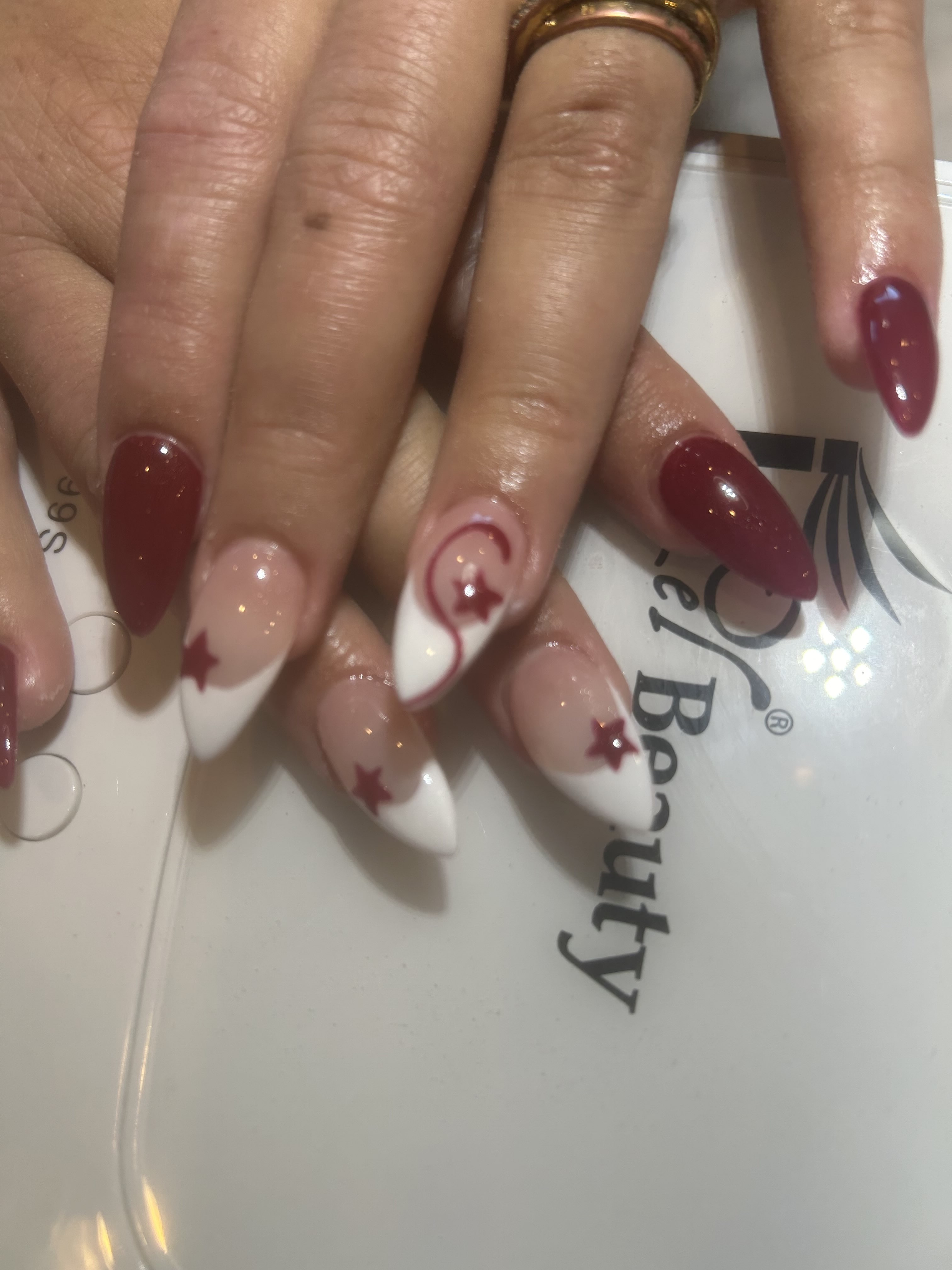Y2K Star Swirl White French Tip Red Accent Mark Nails