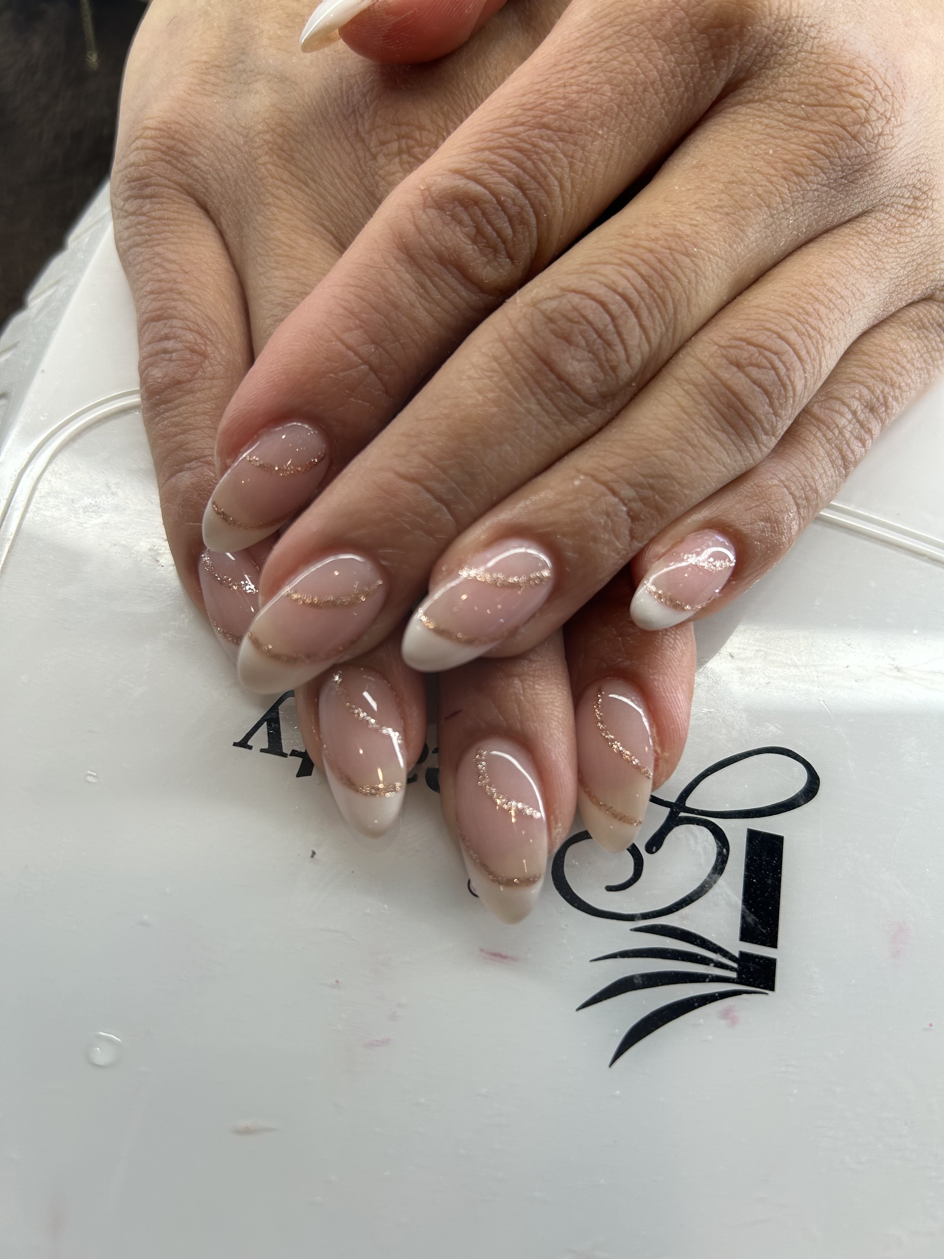 Fancy Nude Base With White French Tip and Gold Accent Swirl Stripe Coffin Nails