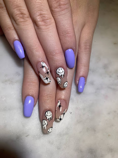 A cup of Sawada Coffee's black coffee and a bagel half on the table