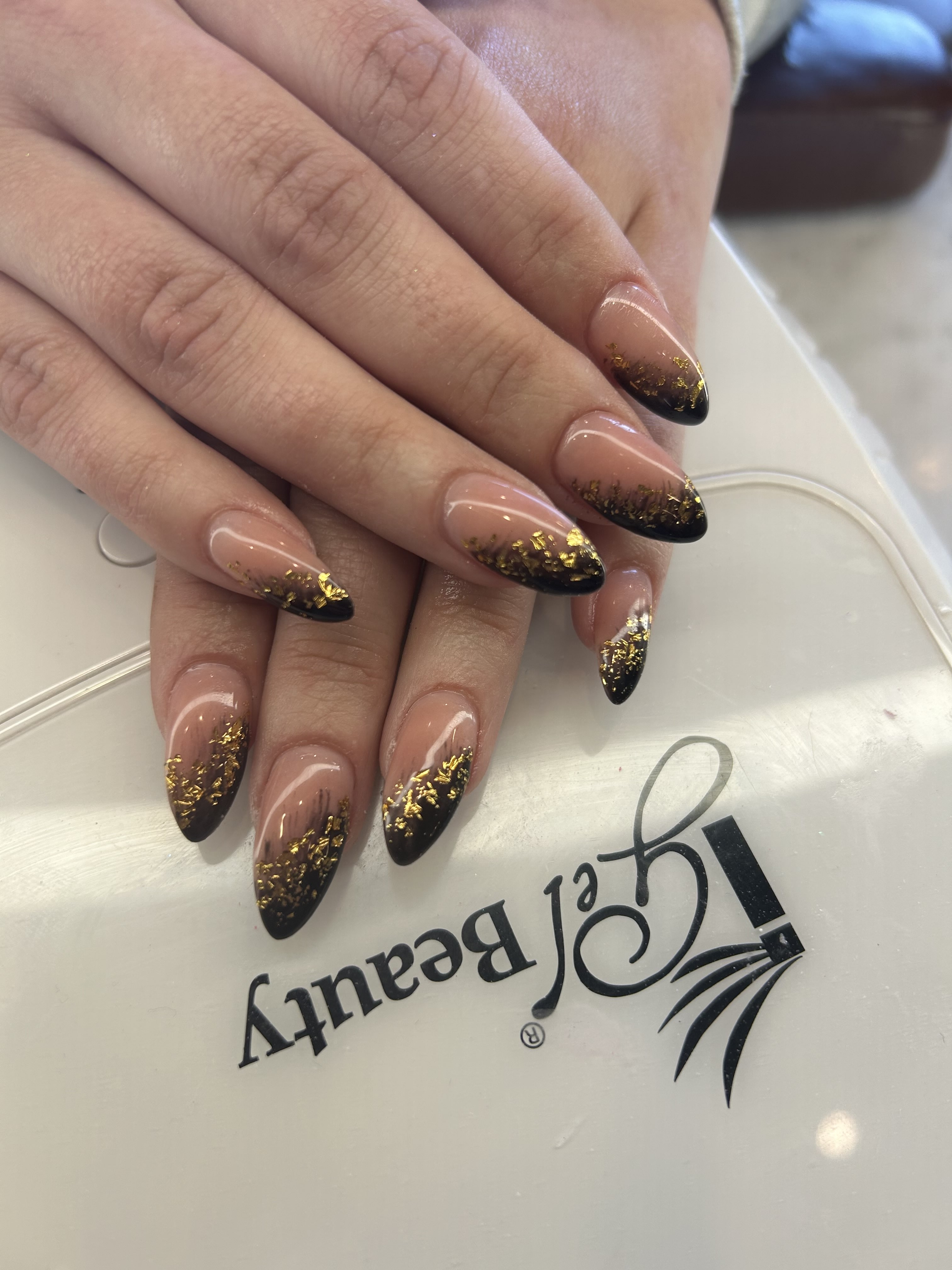 Diagonal Nude to Black Ombre with Gold Glitter Accent Nail Design Nails